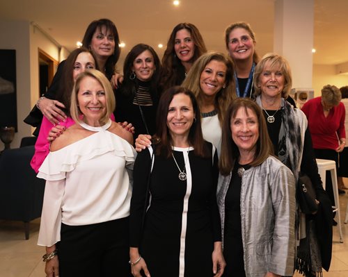 Shira Lewis (front center), stands with Israel Bonds National Women’s Division Israel delegates from Israel Bonds Rockland County, NY office